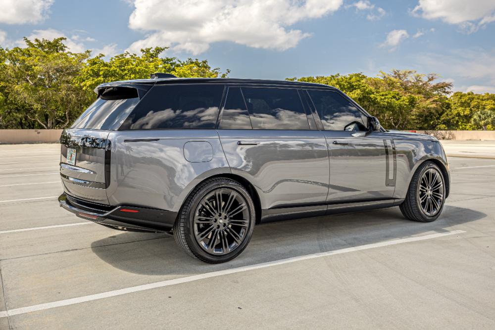 Range Rover (Long Base Autobiography) • Black Car Limo Miami